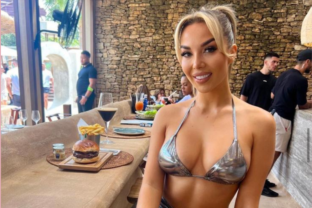 Amelia Goodman in a silver bikini after Breast Enlargement surgery Amelia Goodman in a silver bikini after Breast Enlargement surgery